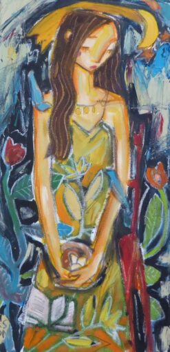 Fille assise dans un jardin avec un nid